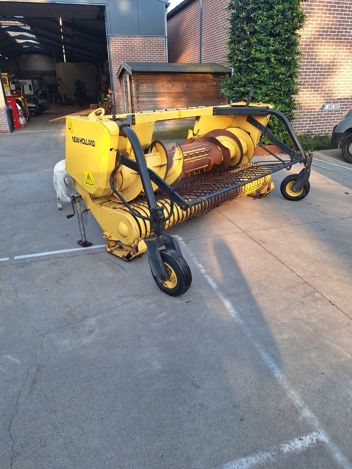New holland graspickup, Ophalen