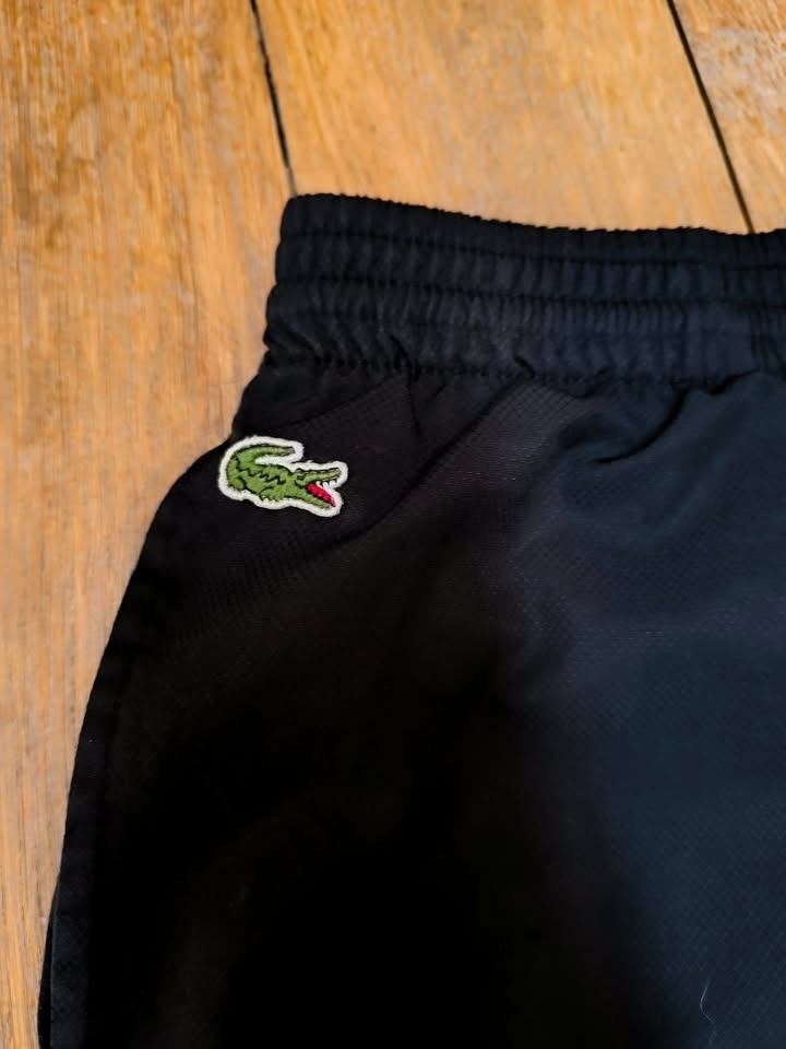 Lacoste zwarte medium broek/trainingspak 176 cm/16 jaar, Maat 48/50 (M), Ophalen of Verzenden, Gedragen, Lacoste