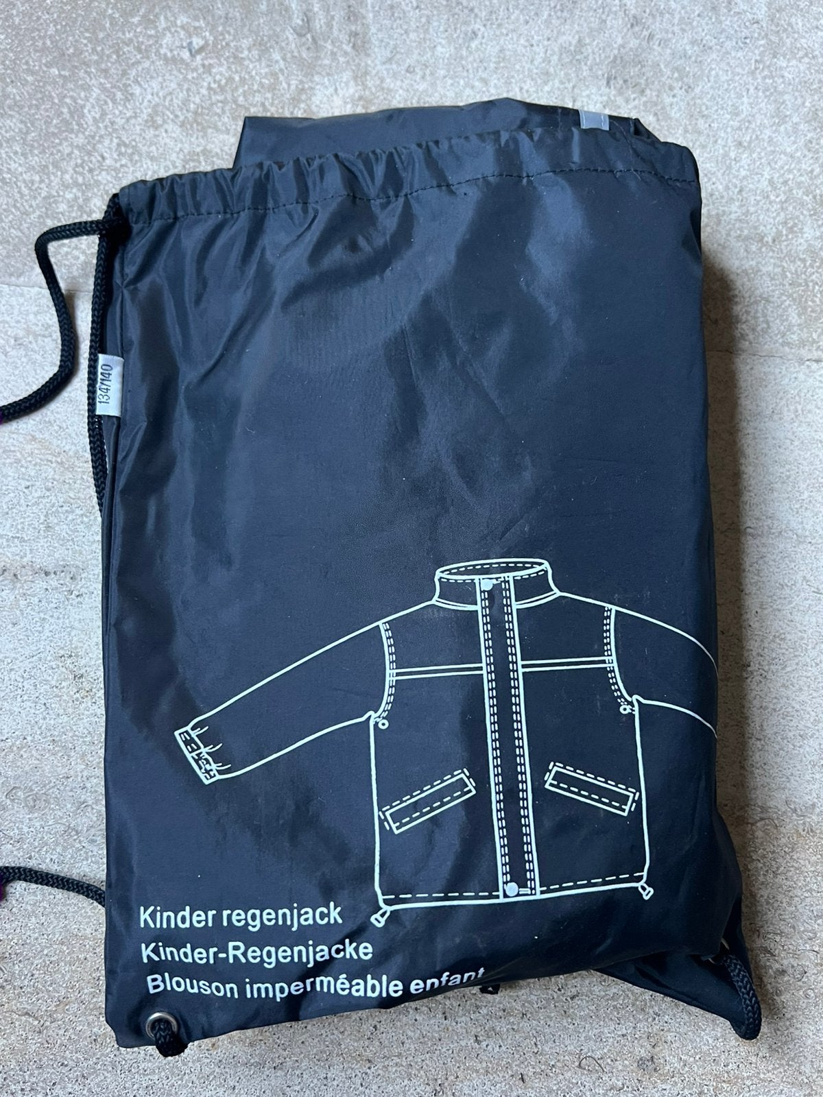 Regenjas maat 134/140, Caravanes & Camping, Enlèvement, Comme neuf, Imperméable, Kinderen