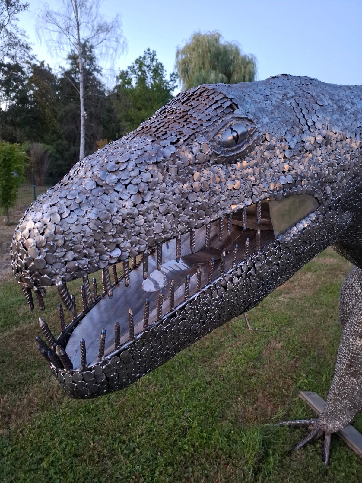 Metalen Dino, Enlèvement