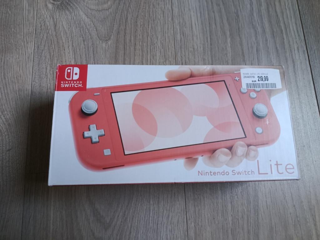 Nintendo Switch Lite Coral, Games en Spelcomputers, Ophalen of Verzenden, Roze of Coral, Zo goed als nieuw