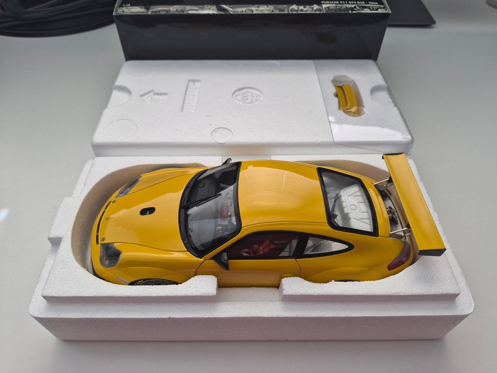 Minichamps 1/18 Porsche 911 GT3 RSR ALMS 2004, Hobby en Vrije tijd, Modelauto's | 1:18, Ophalen of Verzenden, Nieuw, Auto, MiniChamps