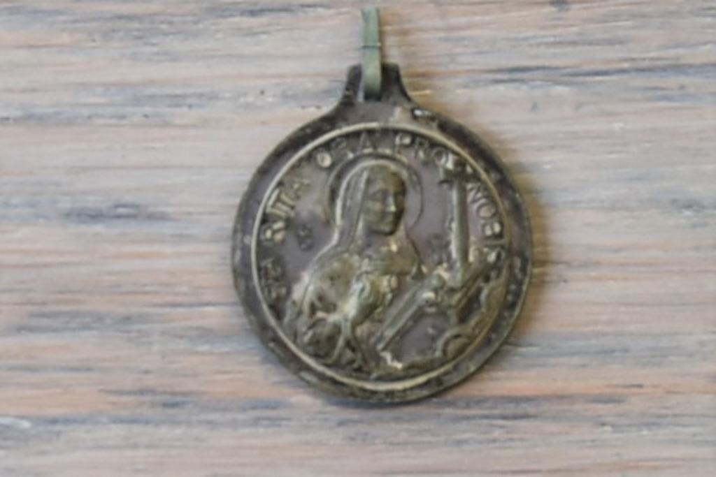 Oude medaille St Rita, Envoi