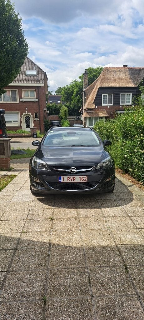 Opel Astra Sports Tourer jaar-2015, Auto's, Voorwielaandrijving, Euro 6, Zwart, Particulier