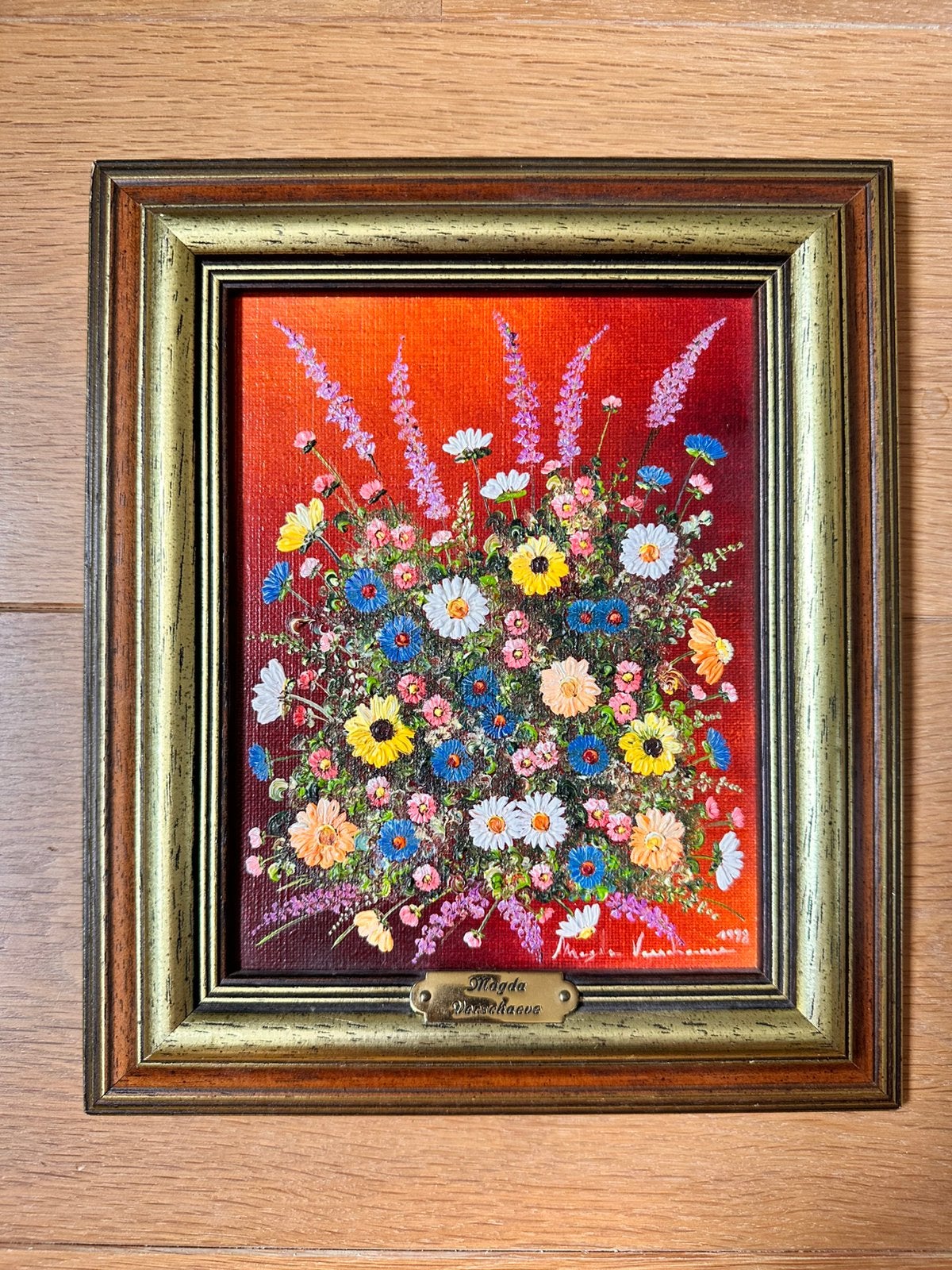 Klein bloemenschilderijtje van Magda Verschaeve, Ophalen