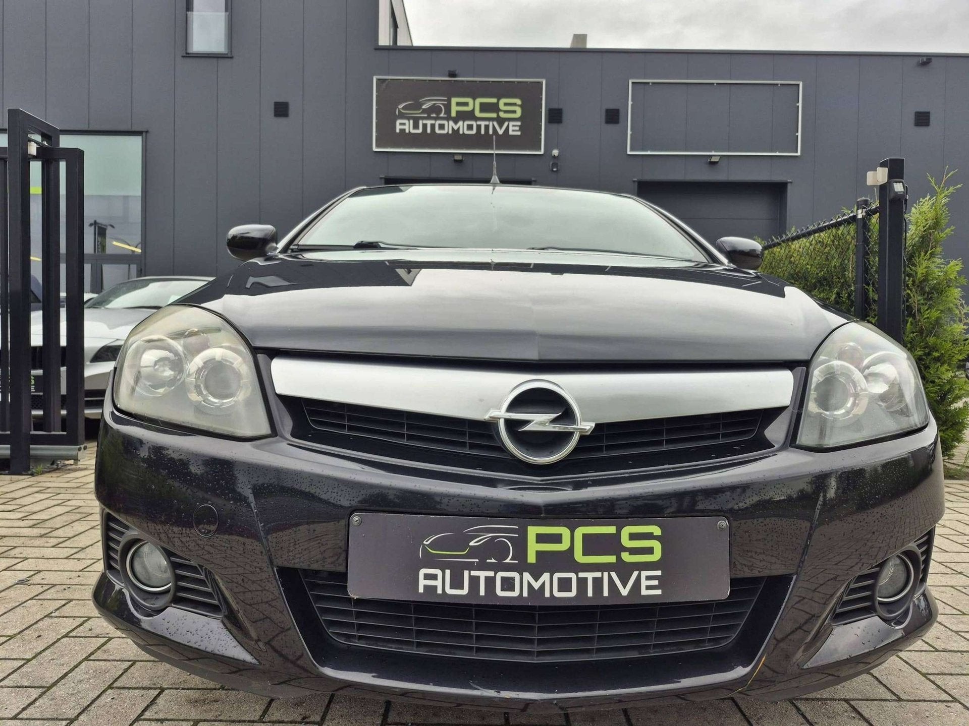 Opel Tigra 1.4 Benzine / 129.0000 km / Hard-Top / 12 mnd Waa, Auto's, Dealer onderhouden, Gebruikt, Zwart, 4 cilinders