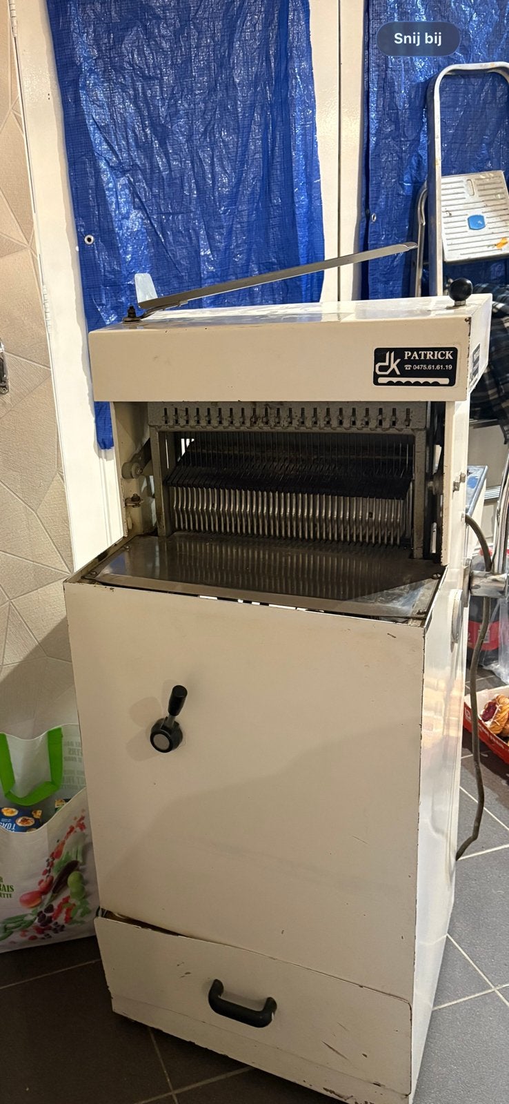 Broodsnijmachine, Ophalen
