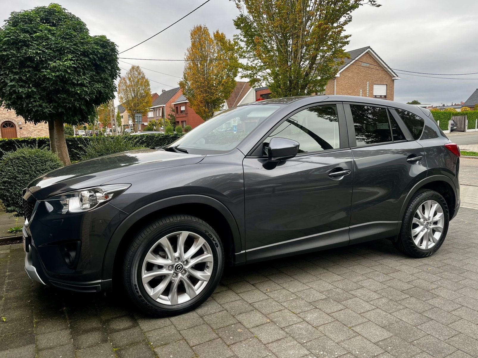 Mazda CX-5 2.0 Skyactiv-G 4x4 6EAT 55.820km!, Auto's, Automaat, 1800 kg, Zwart, Bluetooth