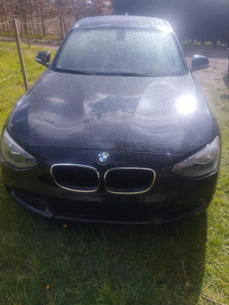 Te koop BMW 116i zeer weinig km, Auto's, 100 kW, Euro 5, 4 cilinders, Zwart