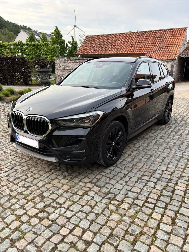 BMW X1 PHEV 1.5iA xDrive25e OPF, Zwart, Leder, 3 cilinders, SUV of Terreinwagen