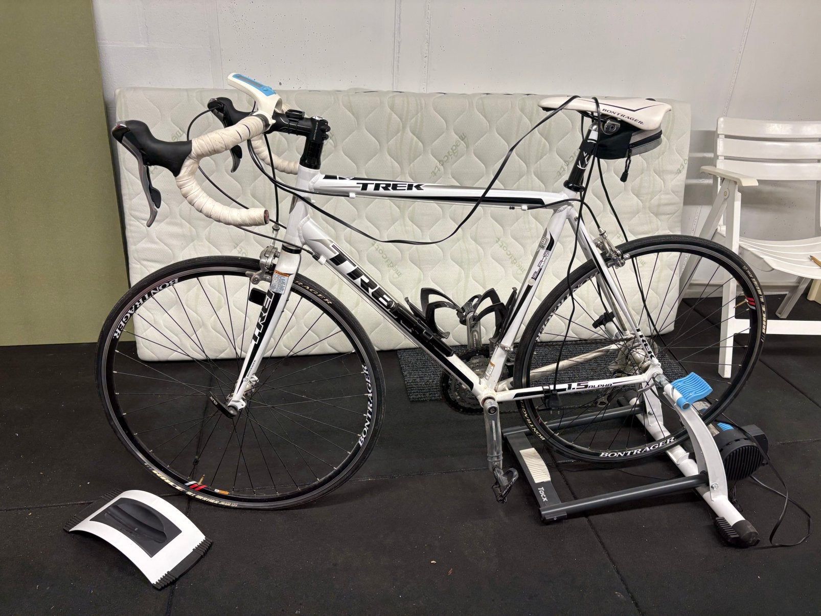Koersfiets & bijbehorende rollenbank, Ophalen, Zo goed als nieuw