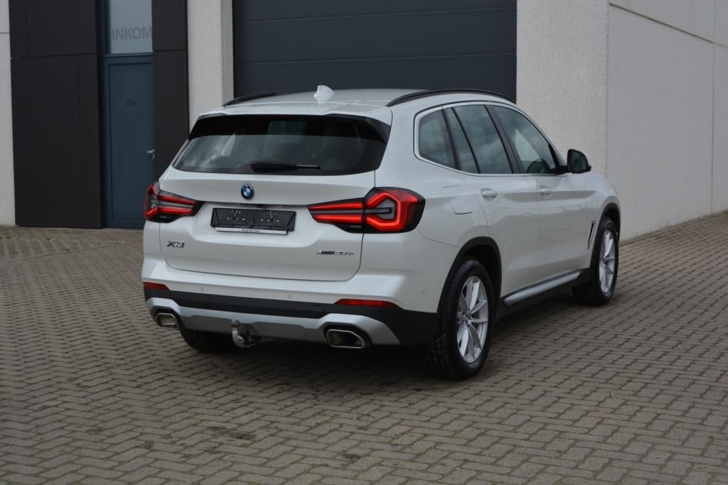 BMW X3 xDrive30e PHEV 292Pk Facelift Navi/Trekhaak/Mod:2023, Auto's, Automaat, 4 cilinders, 2000 kg, Wit