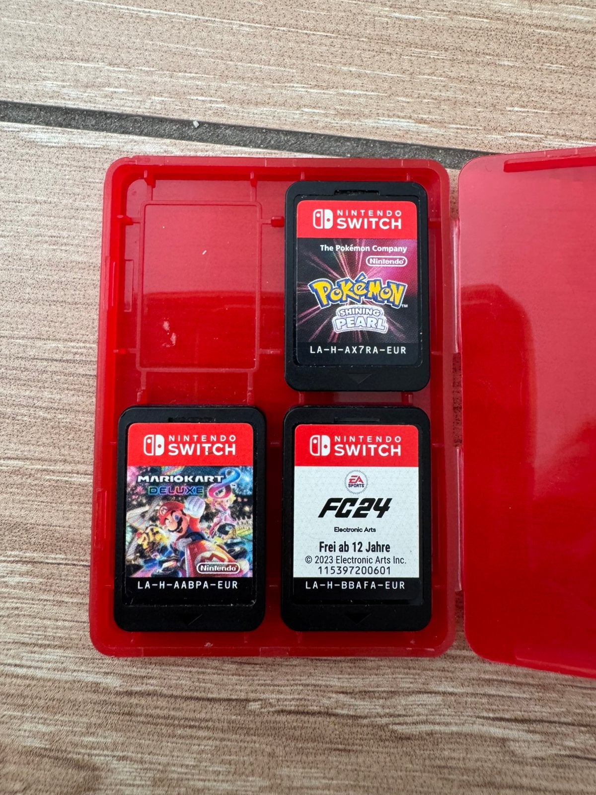 Nintendo Switch spellen (Mario kart, Pokemon en fc24), Enlèvement ou Envoi, Comme neuf, Autres genres