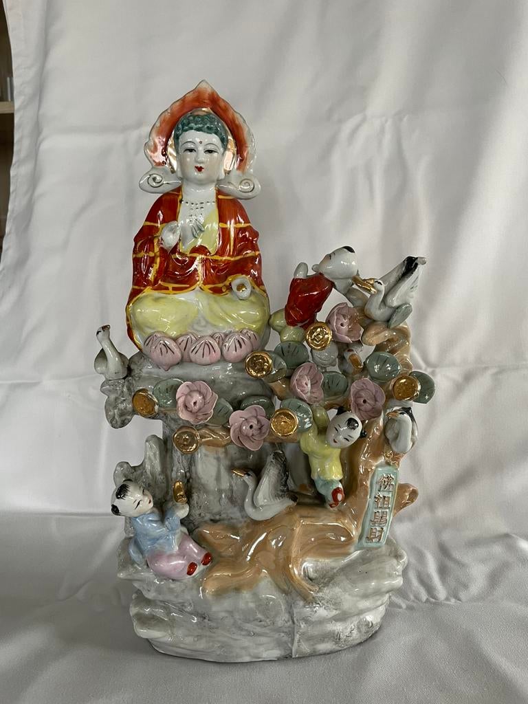 Chinees porseleinen beeld van Guan Yin, Ophalen