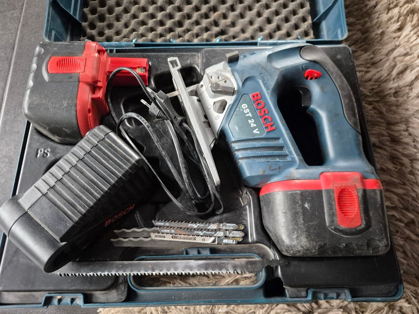 Bosch decoupeerzaag GST 24V Professional, Ophalen