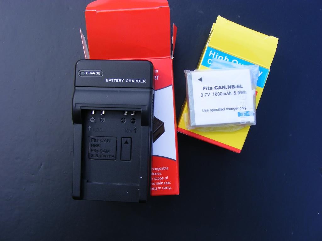 CANON - NIEUWE batterij + oplader voor CANON ixus enz.., Ophalen of Verzenden, Nieuw