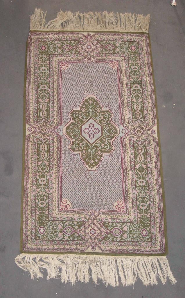 Tapis oriental Alloucha de Kairouan, Enlèvement