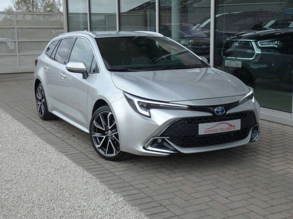 Toyota Corolla 1.8 Hybrid PREMIUM 140pk +Head-up display +Sp, Auto's, 1300 kg, Gebruikt, Zwart, 4 cilinders