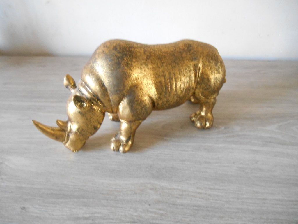 gouden neushoorn, Huis en Inrichting, Woonaccessoires | Lijsten, Ophalen of Verzenden, Zo goed als nieuw