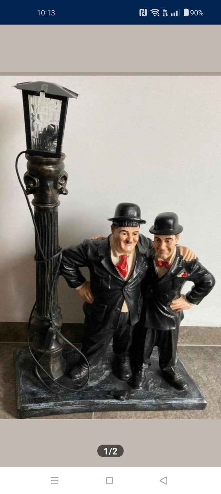 Dikke en dunne met lamp, Ophalen