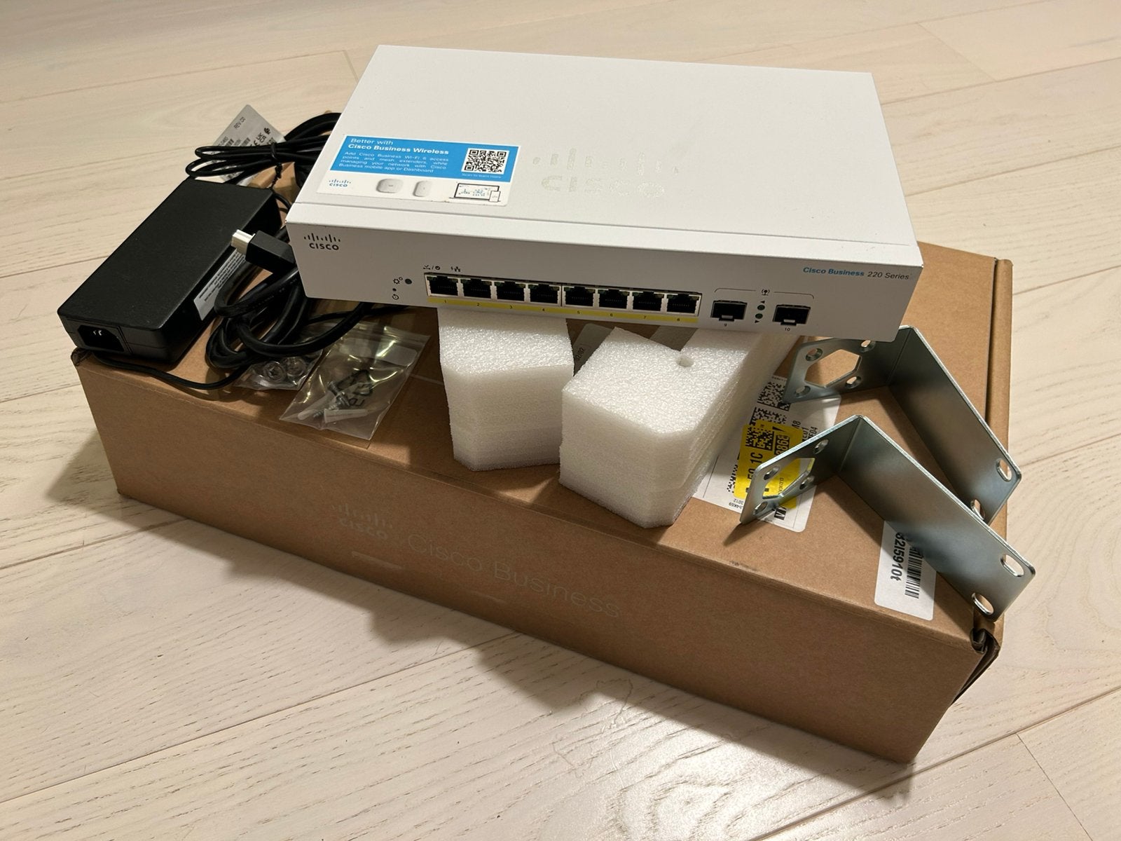 Cisco 220-serie 8-poorts switch, Ophalen, Zo goed als nieuw