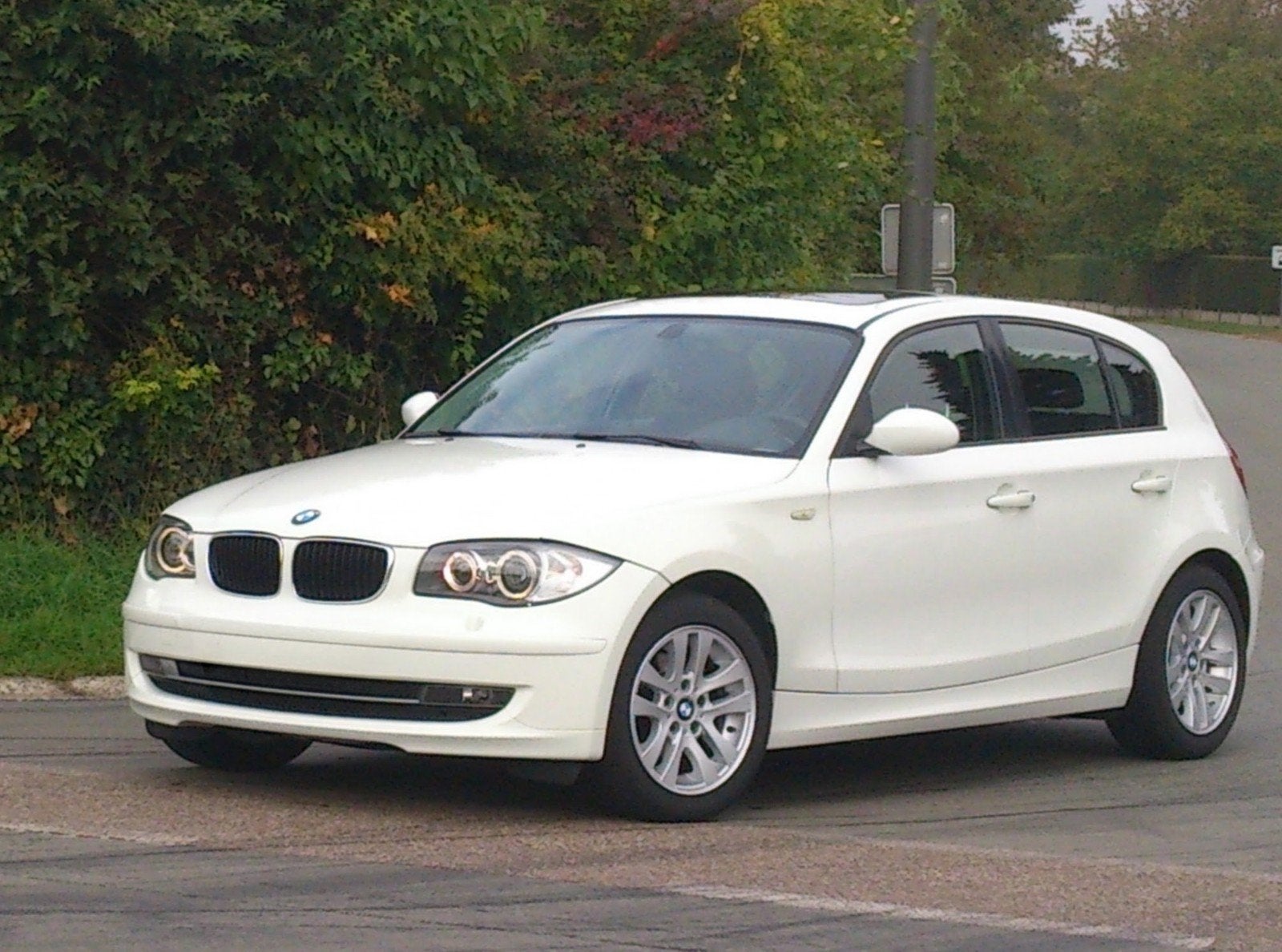 BMW 116i, Auto's, BMW, Zwart, 4 cilinders, Wit, Centrale vergrendeling