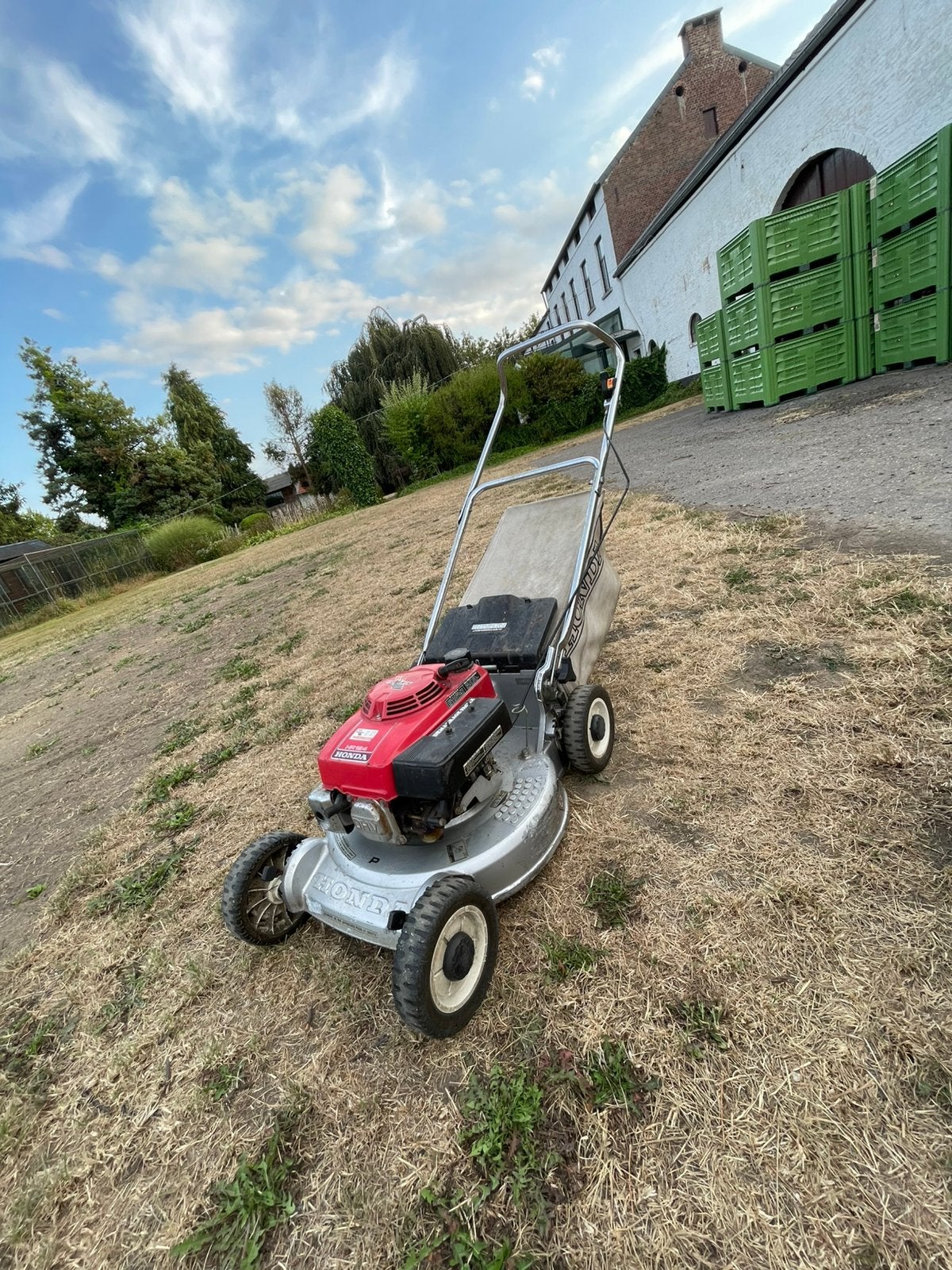 Honda grasmaaier, Tuin en Terras, Grasmaaiers, Ophalen of Verzenden, Gebruikt, Benzine-grasmaaier, Opvangbak