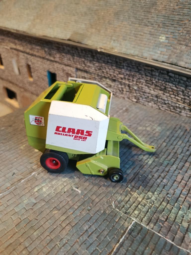 Claas Rollant 250 Roto Cut Siku Press, Hobby en Vrije tijd, Modelauto's | 1:32, Ophalen of Verzenden, Gebruikt, Tractor of Landbouw