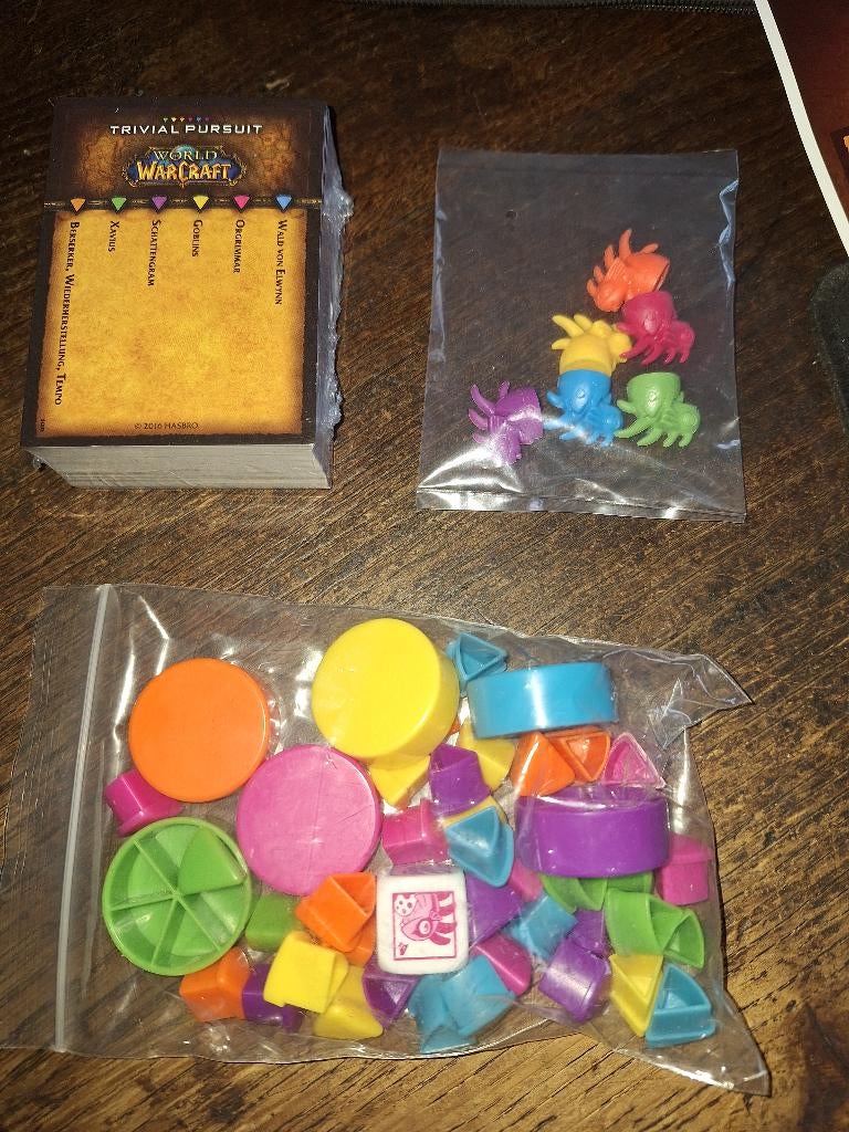 TRIVIAL PURSUIT WORLD OF WARCRAFT in het Duits, Drie of vier spelers, Ophalen of Verzenden, Zo goed als nieuw, Hasbro