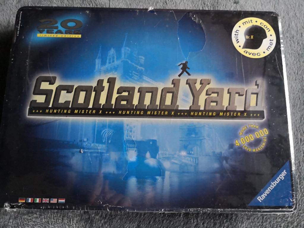 Scotland yard - hunting mr X bordspel in tinnen doos met pet, Enlèvement