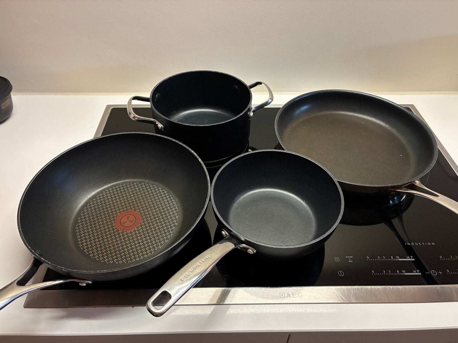 Tefal en kitchenaid pannen – 4 pannen + 2 panbeschermers, Ophalen, Inox, Gebruikt, Inductieplaat