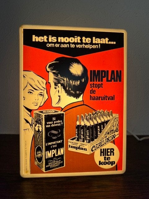 publicité pour Implan, pour stopper la chute des cheveux, Enlèvement