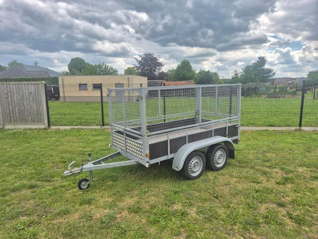 Dubbelas aanhangwagen met loofrekken 750kg, Ophalen
