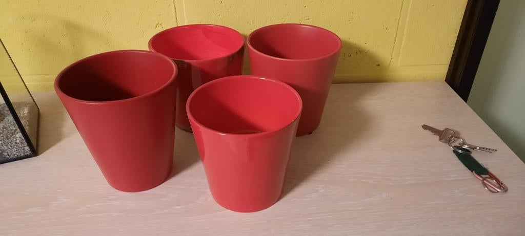 4 rode bloempotten, Ophalen