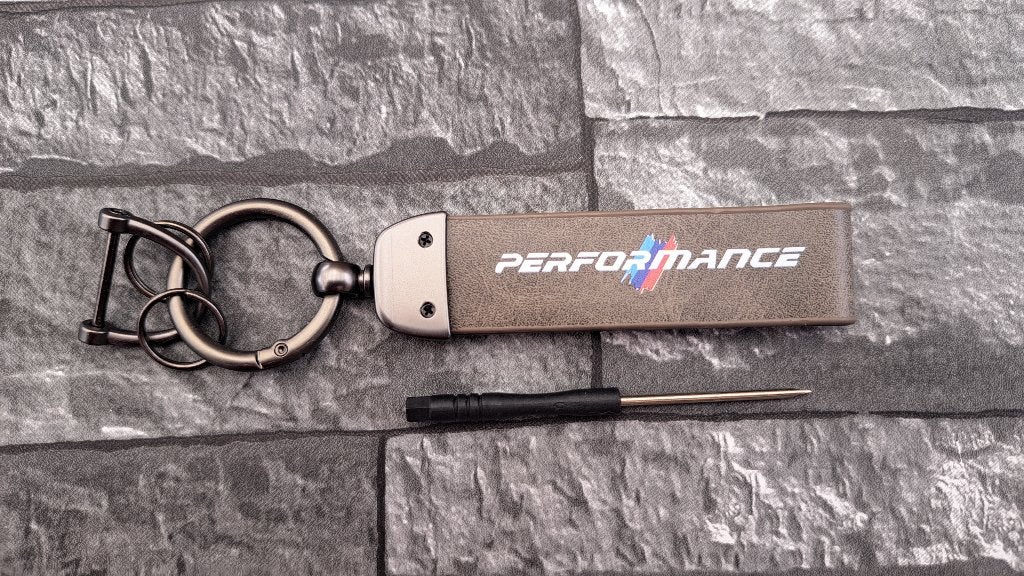 porte-clé BMW Performance brun, Verzamelen, Sleutelhangers, Overige typen, Nieuw, Ophalen of Verzenden