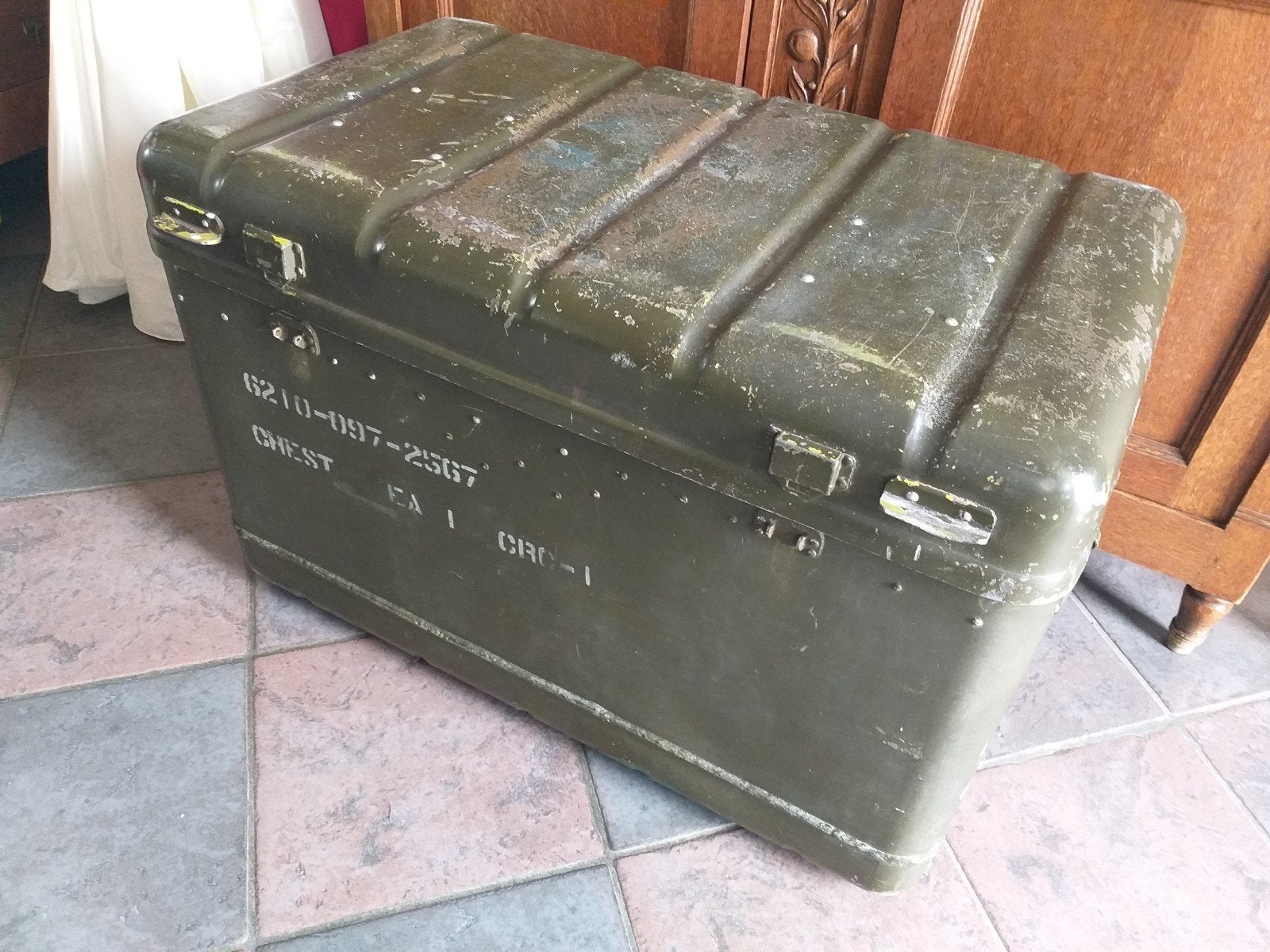 Metalen leger kist, Ophalen