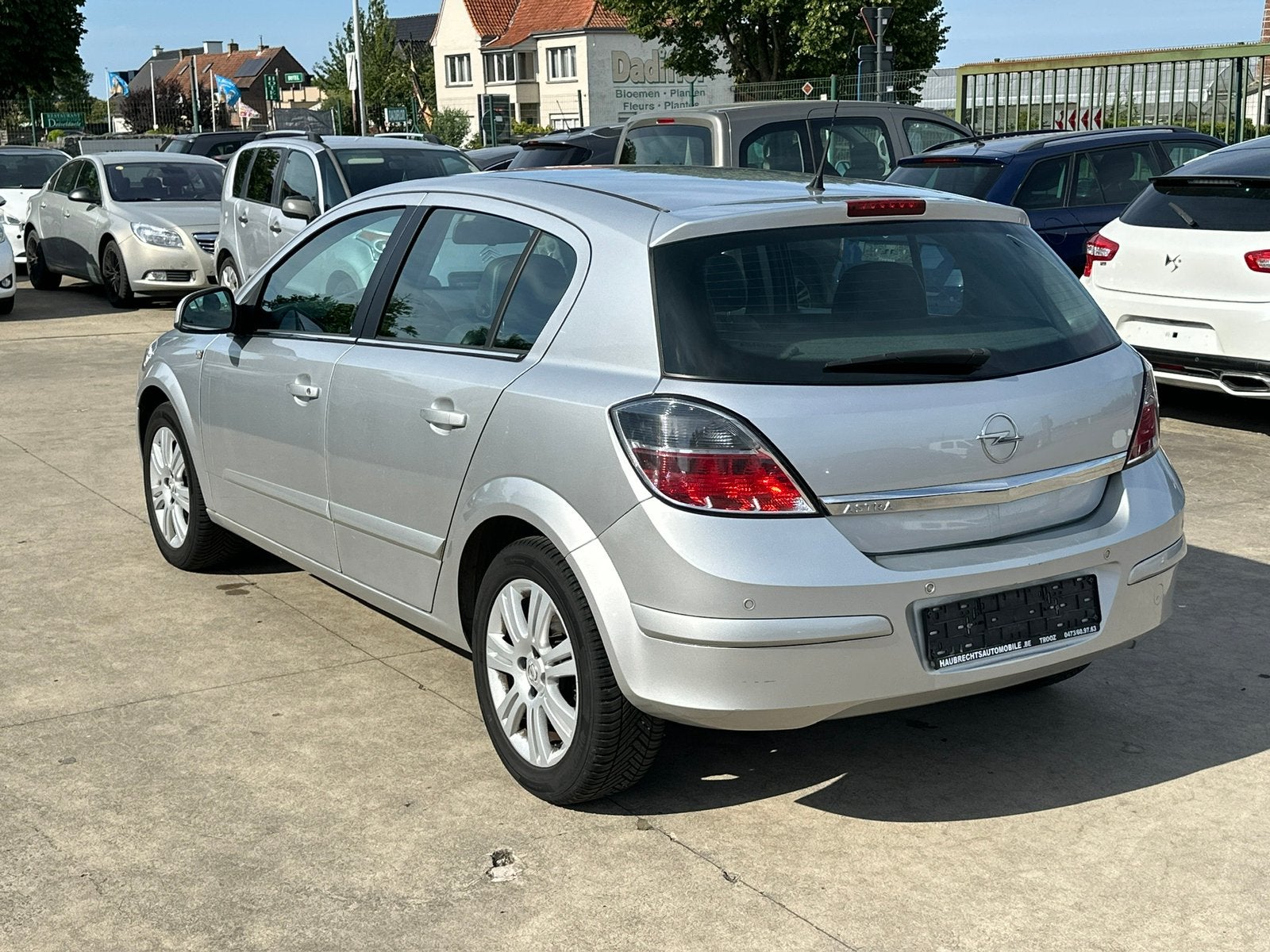 Opel Astra 1.4 L benzine genoeg optie eerste eigenaar, Auto's, Zwart, 4 cilinders, Leder en Stof, Bedrijf