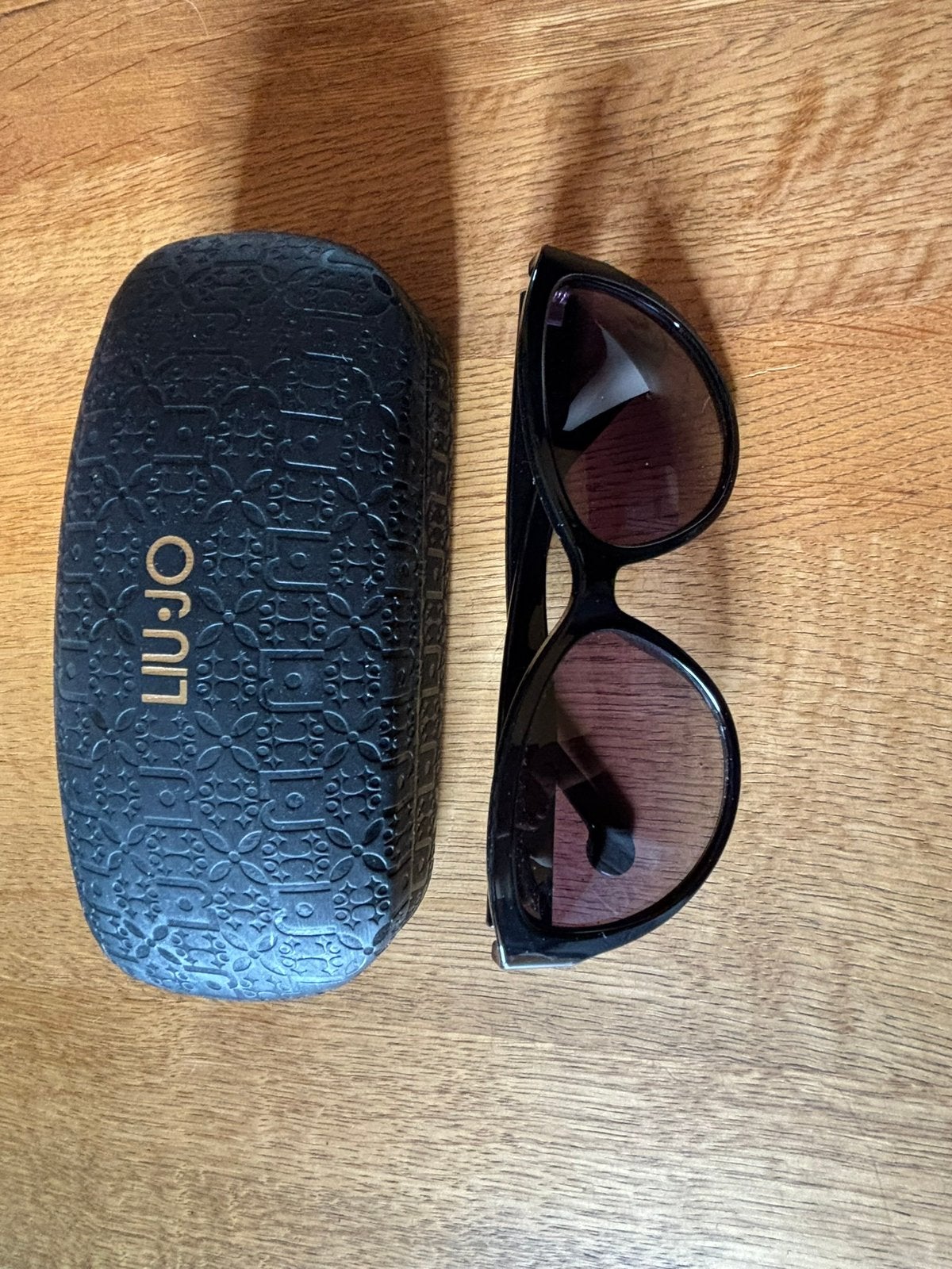 Lunettes de soleil impeccables liujo, Handtassen en Accessoires, Ophalen of Verzenden, Zo goed als nieuw, Bril