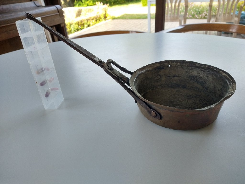 Koperen steelpan, Ophalen