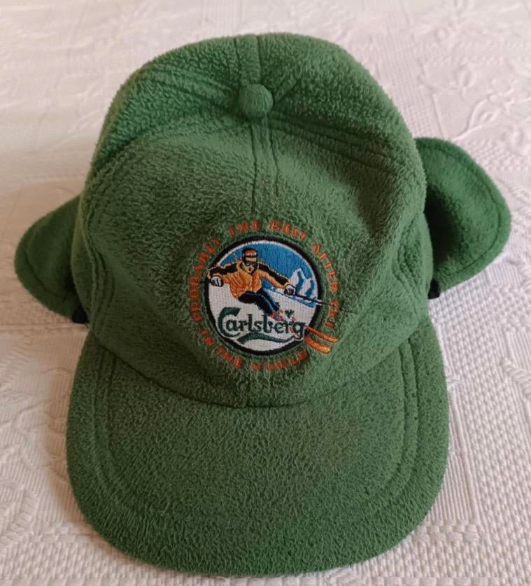 vintage groene Carlsberg-skimuts "after-ski" accessoire., Ophalen of Verzenden, Gedragen, One size fits all, Pet