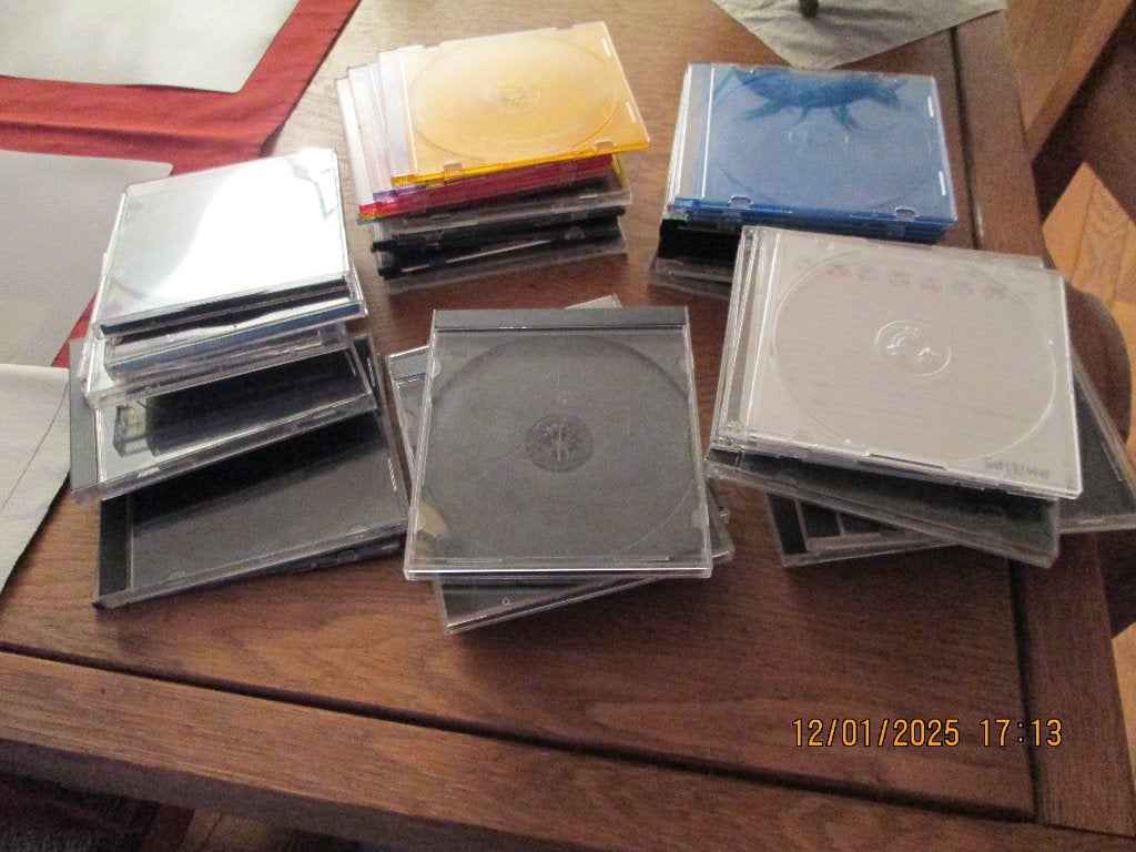 Boitiers vides pour CD/DVD., Huis en Inrichting, Woonaccessoires | Cd- en Dvd-rekken, Ophalen, Zo goed als nieuw, Cd's of Dvd's