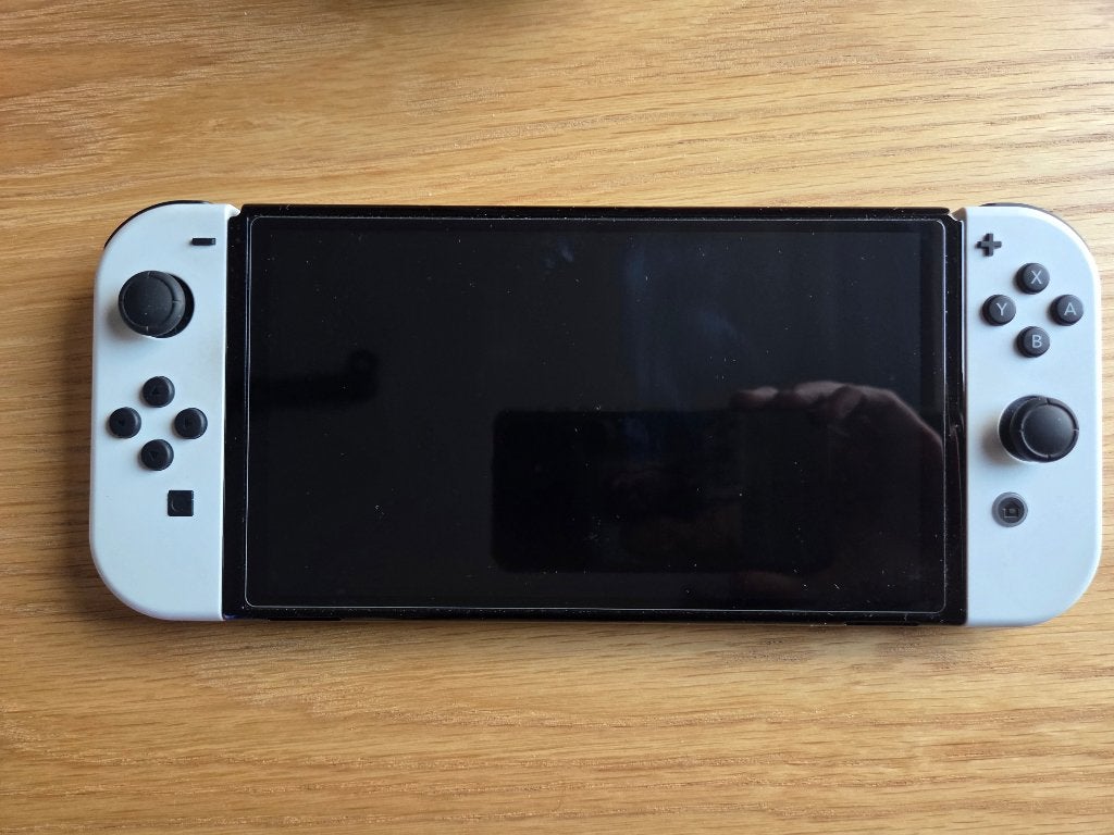 Nintendo Switch OLED + games + accessoires, Games en Spelcomputers, Switch OLED, Met games, Ophalen of Verzenden, Zo goed als nieuw