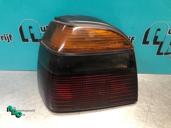 Feu arrière gauche d'un Volkswagen Golf (Golf 91-), Autos : Pièces & Accessoires, Volkswagen, -, 3 mois de garantie, Utilisé