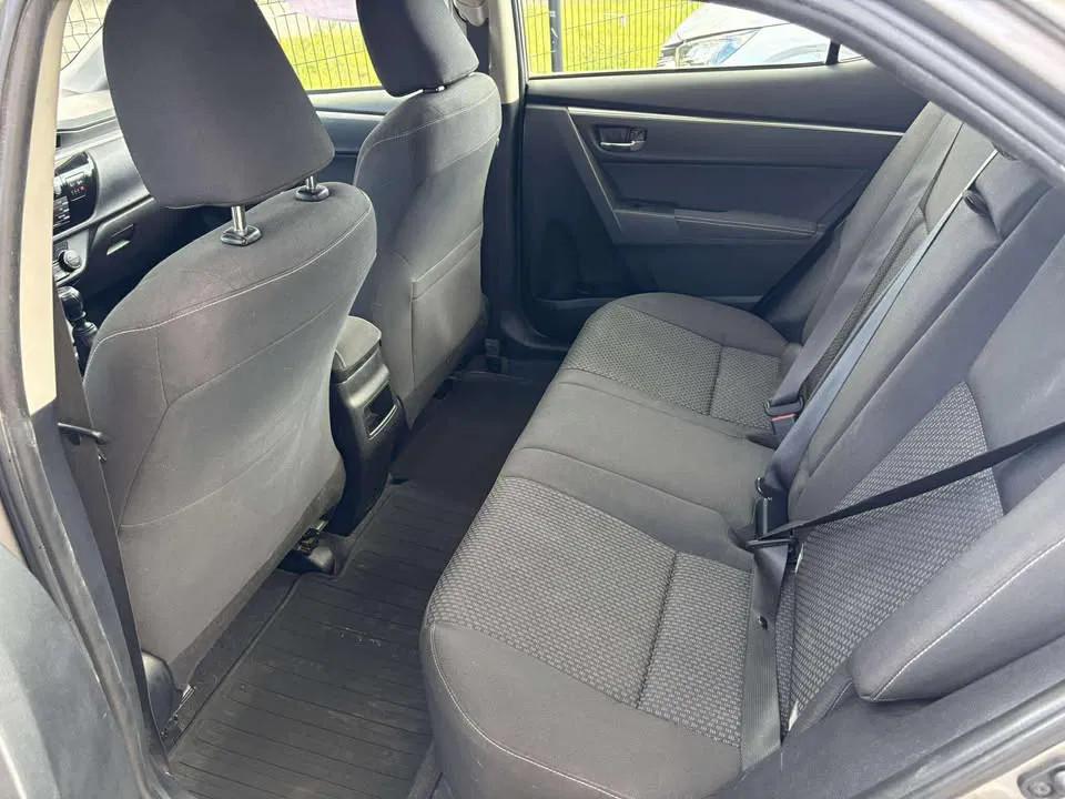 Toyota Corolla (bj 2014), Auto's, Euro 5, Stof, Gebruikt, Zwart