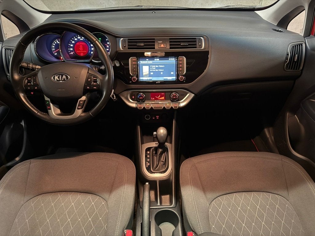 Kia Rio 1.4i | OPENDAK | CAMERA | NAVI | AIRCO | ELEK RUIT !, Dealer onderhouden, Stof, 4 cilinders, 1396 cc