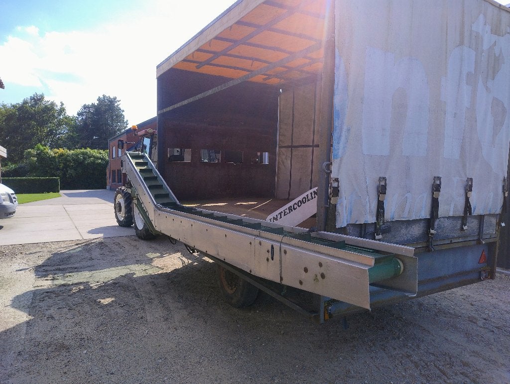 oogstwagen met oogstband, Ophalen