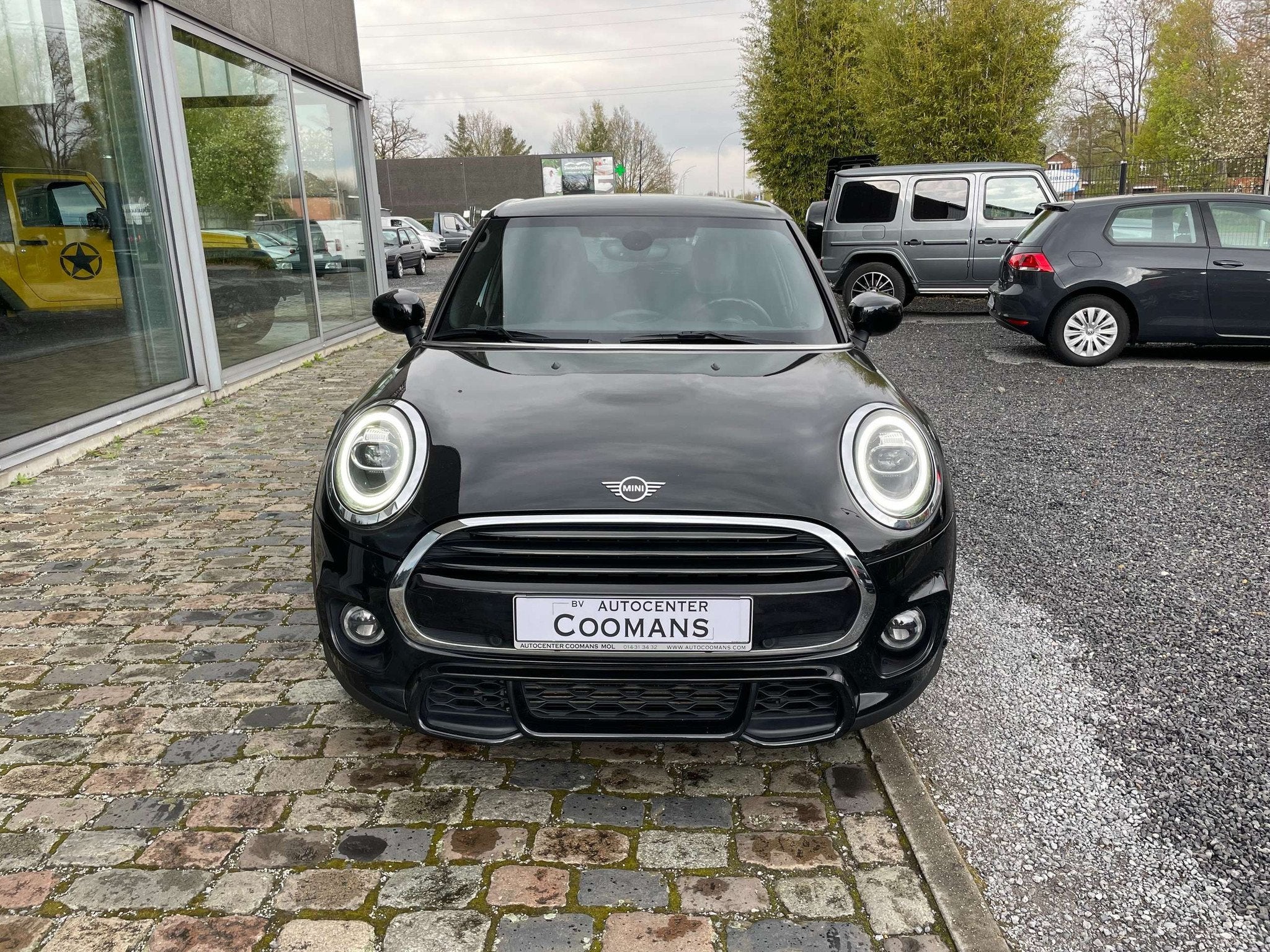 MINI Cooper 1.5 OPF (EU6d-TEMP) JWC (bj 2019), Stof, Gebruikt, 136 pk, Zwart