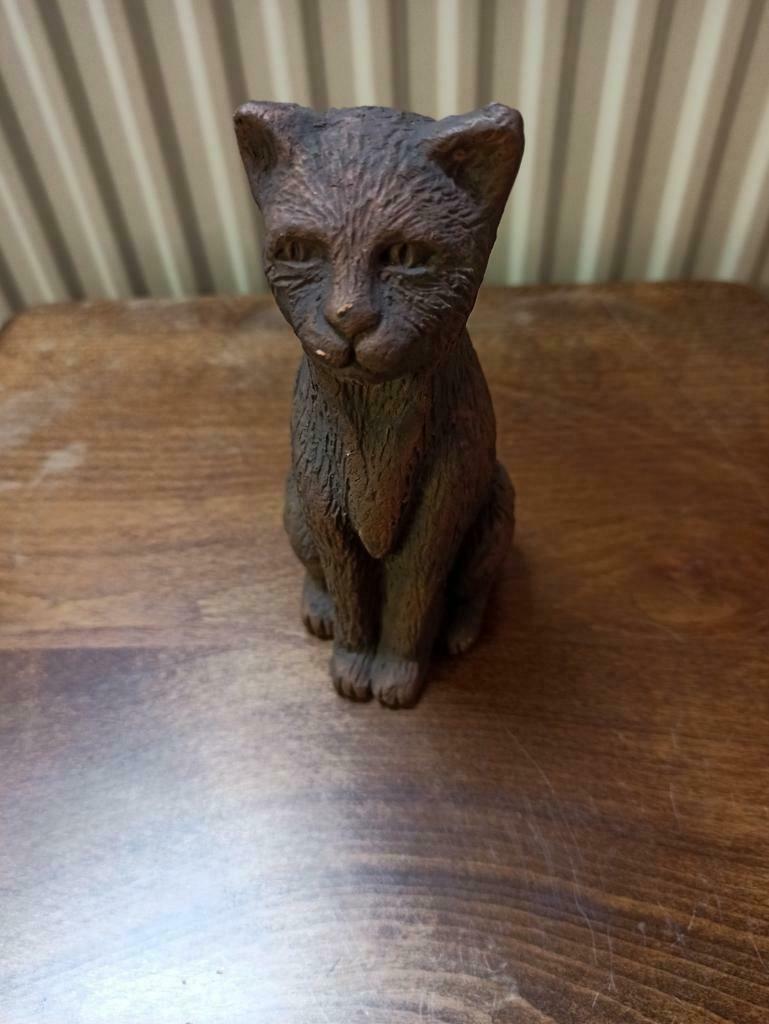 Gesigneerde terracotta kat, Ophalen