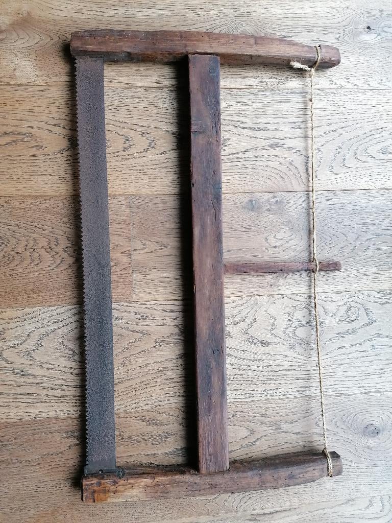 Oude handhouthakkerzaag, Ophalen