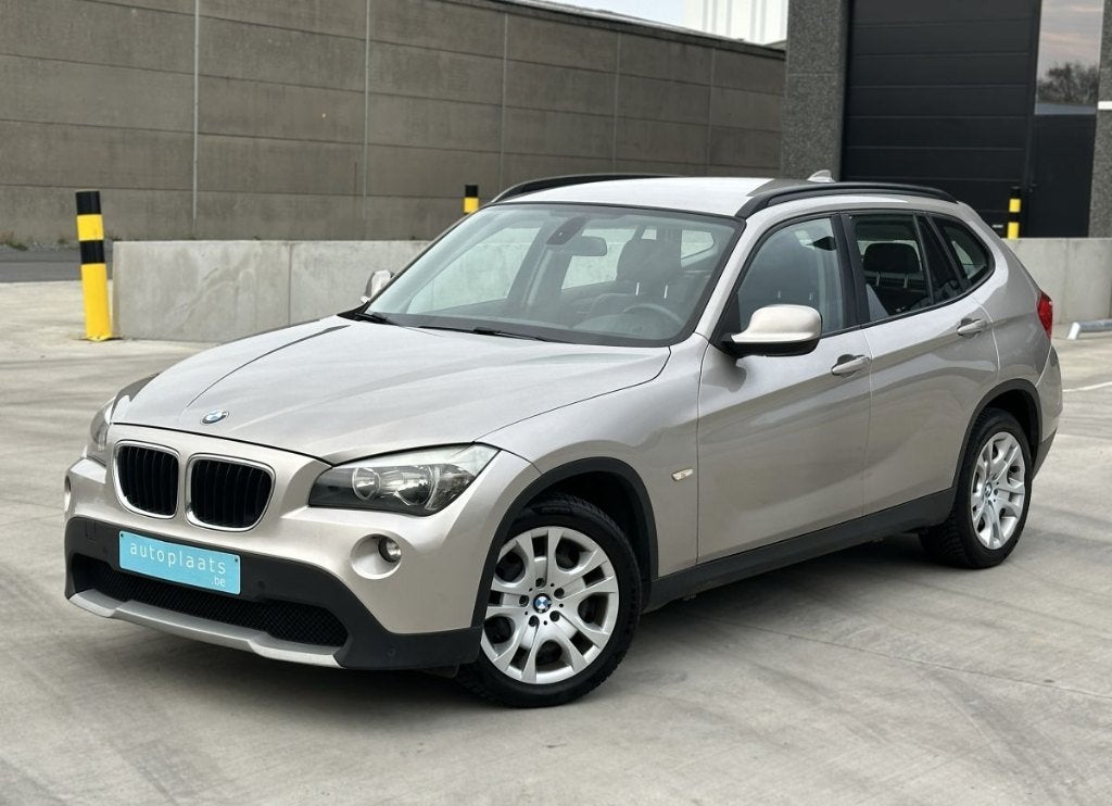 BMW X1 sDrive18d 2011 Automaat 130450km Navi Cruise Leder, Auto's, BMW, Euro 5, 1995 cc, Zwart, Beige